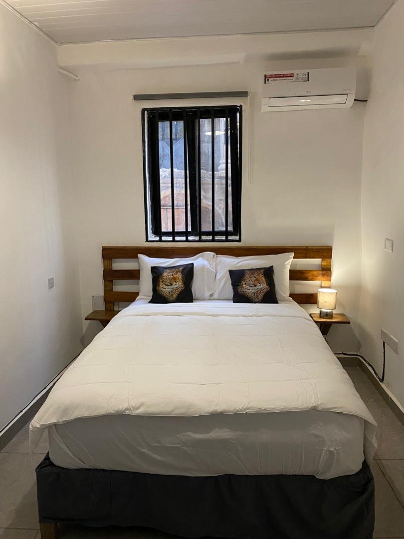 Comfort room bed beneath the window
