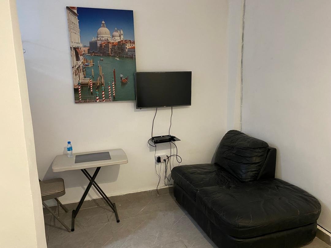 Comfort room work desk and flat-screen TV