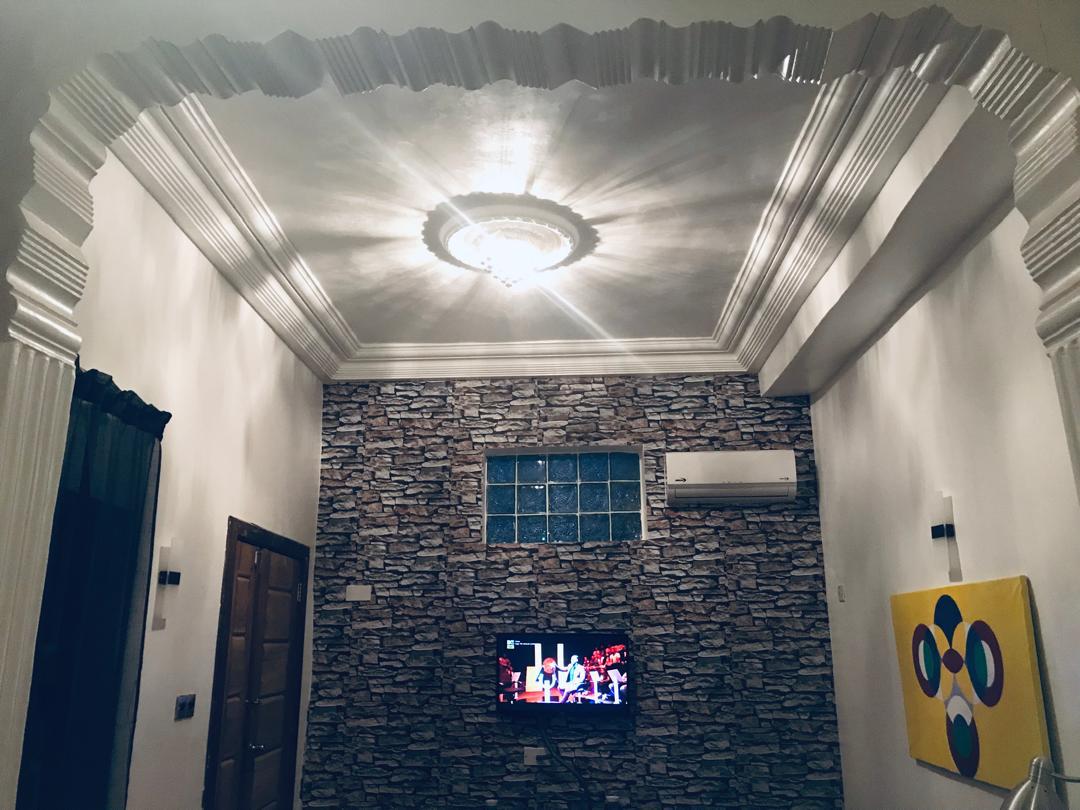Belvoir lounge area with stone accent wall