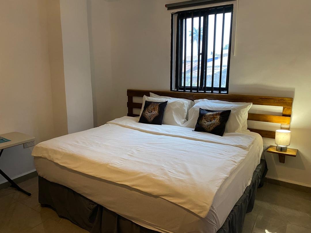 Superior deluxe king bed beside the window