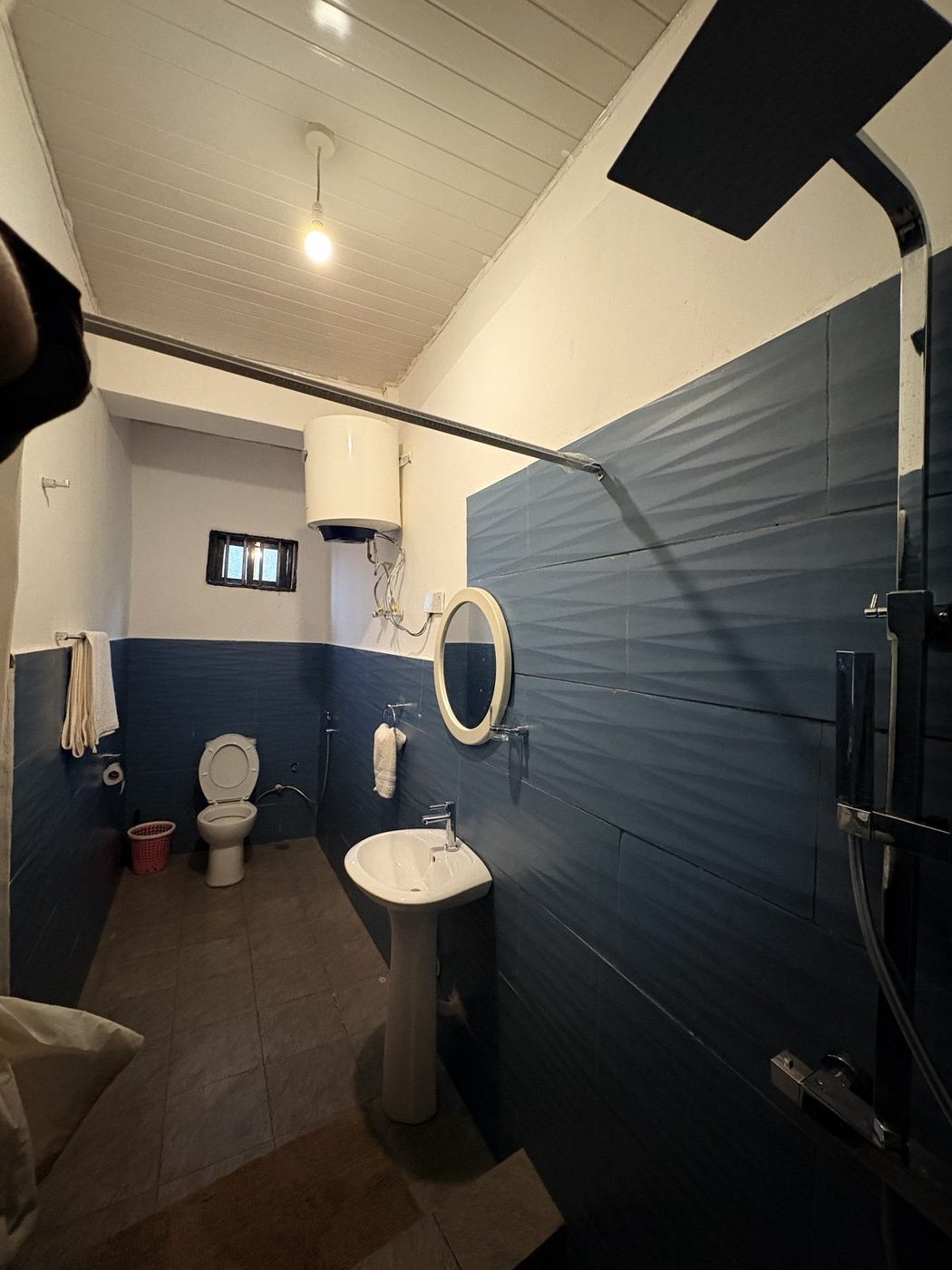 En-suite bathroom with rain shower