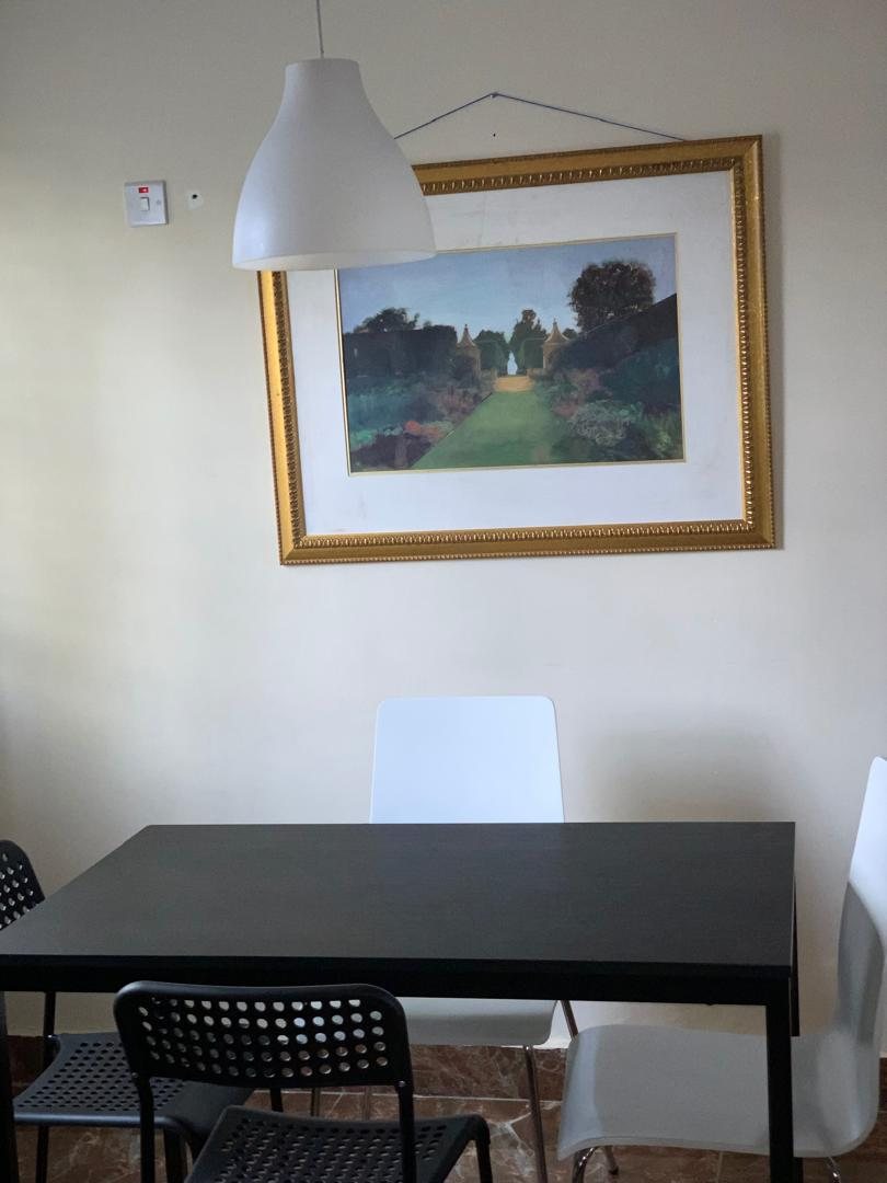 Two-bedroom apartment dining table seating four